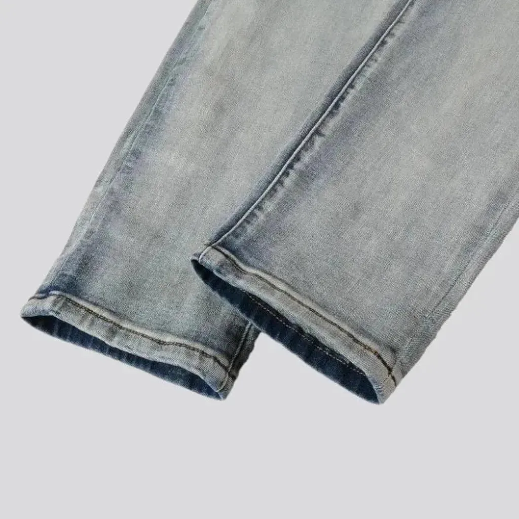 Mid rise men's distressed jeans