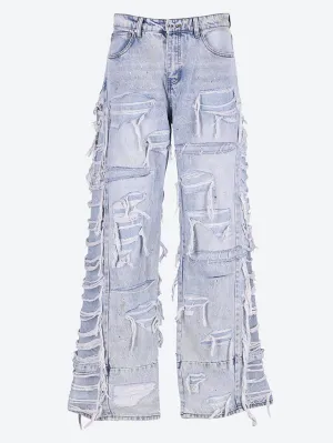 Ultra flare distressed denim jeans